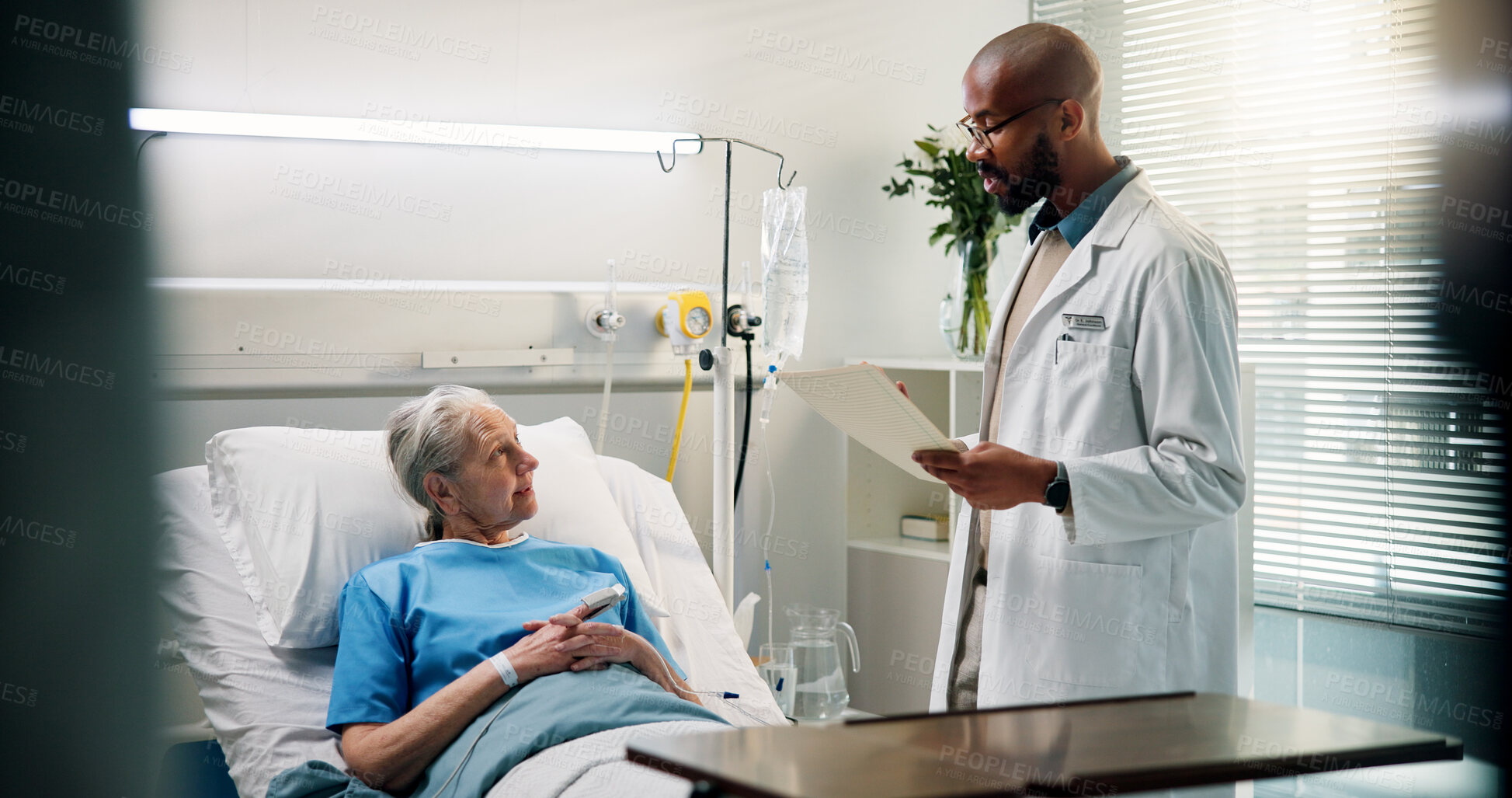 Buy stock photo Doctor, old woman and discussion with report in hospital bed for recovery, health update and results. Healthcare, elderly patient and professional with file in clinic for medical feedback or progress