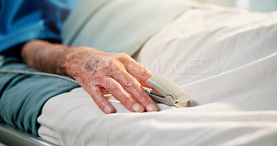 Buy stock photo Hands, old person and rest with oximeter in hospital bed to monitor pulse, blood levels and post surgery. Closeup, elderly patient and medical device to track oxygen, chronic condition and operation