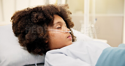 Buy stock photo Healthcare, oxygen and recovery with boy in hospital bed for breathing, resting or treatment. Medical, sleeping and tubes with child patient lying in clinic for healing, rehabilitation or wellness