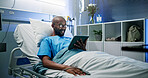 Medical, rest or black man in hospital with tablet, ebook or video streaming in post surgery. Health, glasses or patient in clinic with tech, entertainment subscription or online reading in recovery.