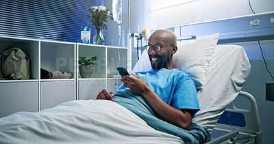Buy stock photo Medical, smile or black man in hospital with phone, video streaming or message update on surgery. Healthcare, happy and patient in clinic with tech, digital scroll or online communication in recovery