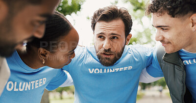 Buy stock photo Volunteer, man and group in huddle outdoor for community service, NGO and help for social responsibility. Support, team and people with discussion for motivation, nonprofit and activism in park 