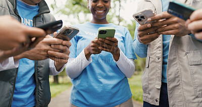 Buy stock photo Phone, volunteer and solidarity with hands of people in nature for community service chat, team and eco ngo app. Environment fundraising, tech and social media with low angle of friends outdoor