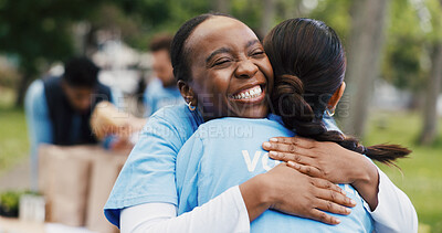Buy stock photo Happy woman, hug or volunteer with support for community service or commitment together in park. Female person, team or NGO with smile, trust or embrace for outreach, charity or donation in nature