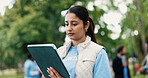 Tablet, woman and volunteer in nature for charity, ngo or community service event at park. Technology, checklist and female non profit worker with planning, online or donation outreach outdoor.