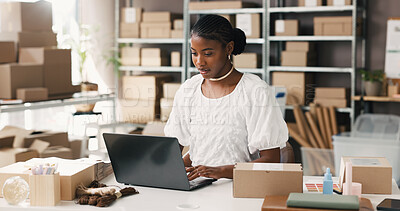 Buy stock photo Ecommerce, logistics or entrepreneur with laptop in office, review stock info or check supplier details. Inventory catalog, business owner or black woman reading with pc, supply chain or distribution