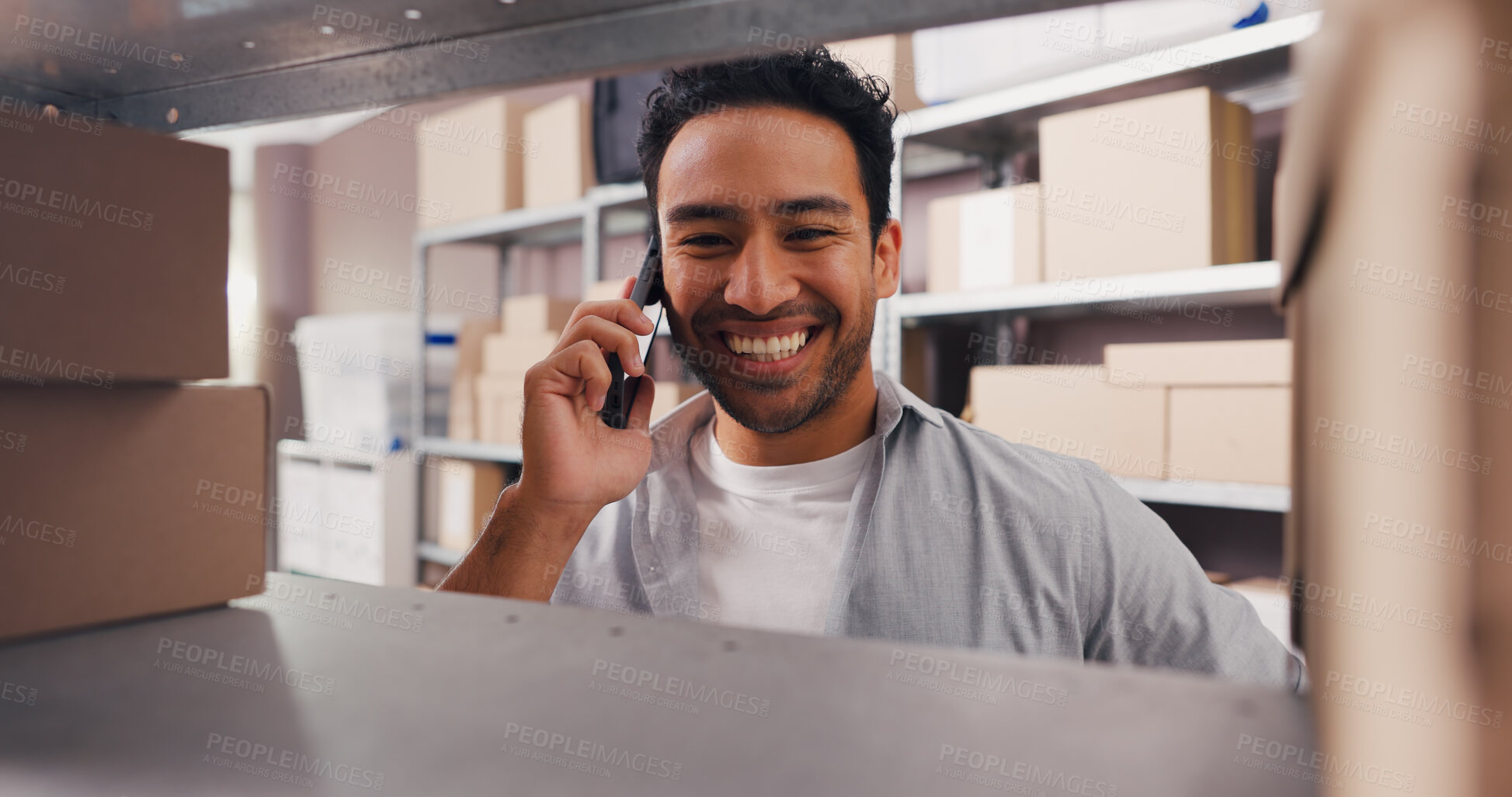 Buy stock photo Smile, man and phone call for logistics in warehouse for inspection, contact supplier and schedule. Male person, boxes and mobile for discussion, quality assurance and order inquiry for distribution
