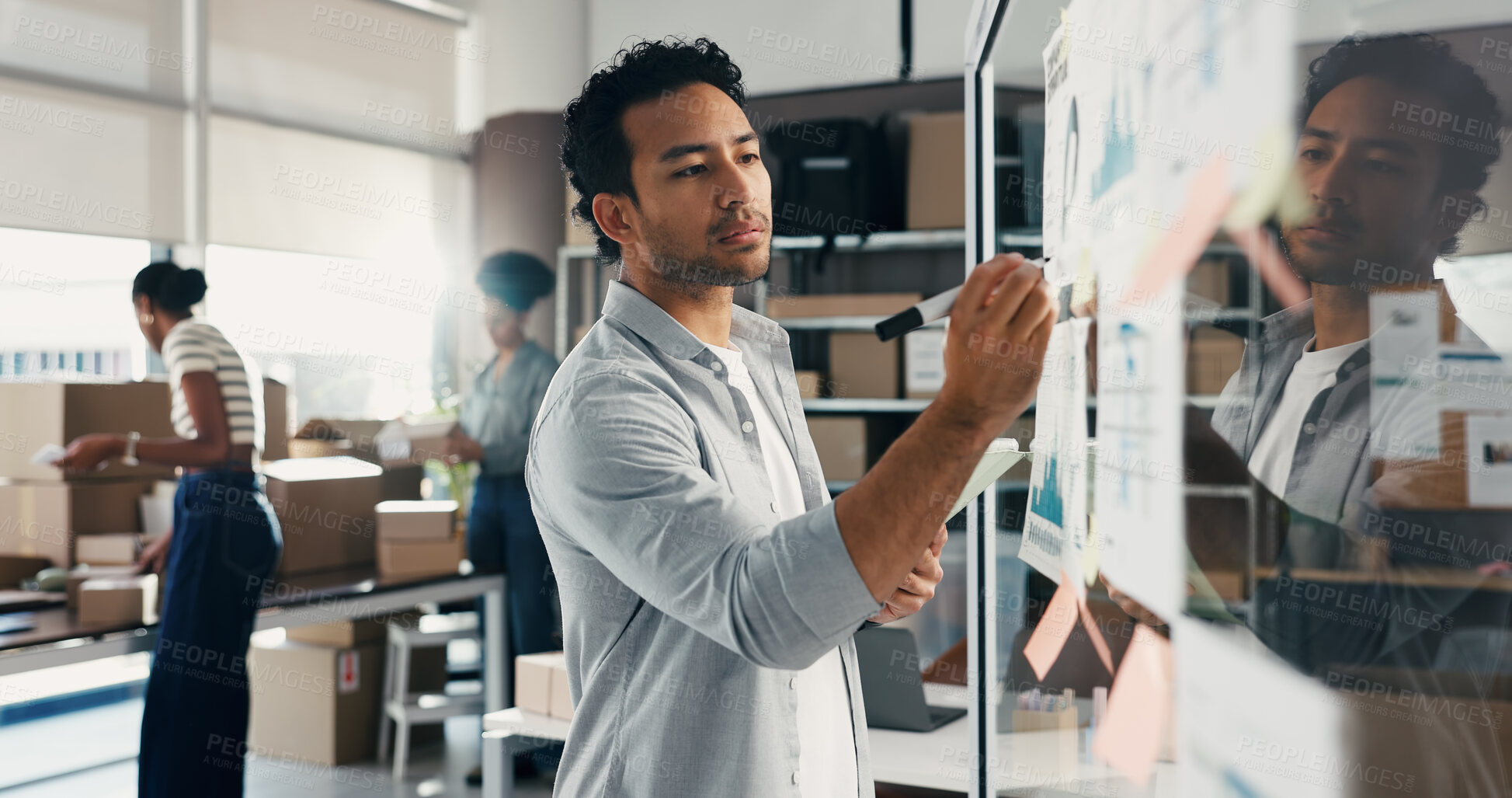 Buy stock photo Logistics, man or writing with strategy at glass wall for ecommerce, retail planning or shipping stats. Person, brainstorming or sticky note in office with tablet, supply chain or distribution graph.