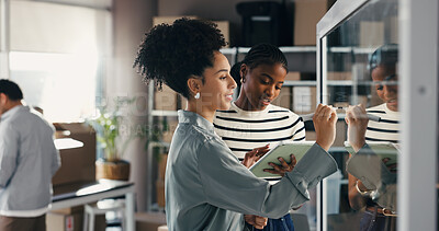 Buy stock photo People, writing and talk with tablet at glass wall for brainstorming ecommerce, logistics and shipping. Team, discussion and research in office with tech, supply chain strategy and distribution plan.