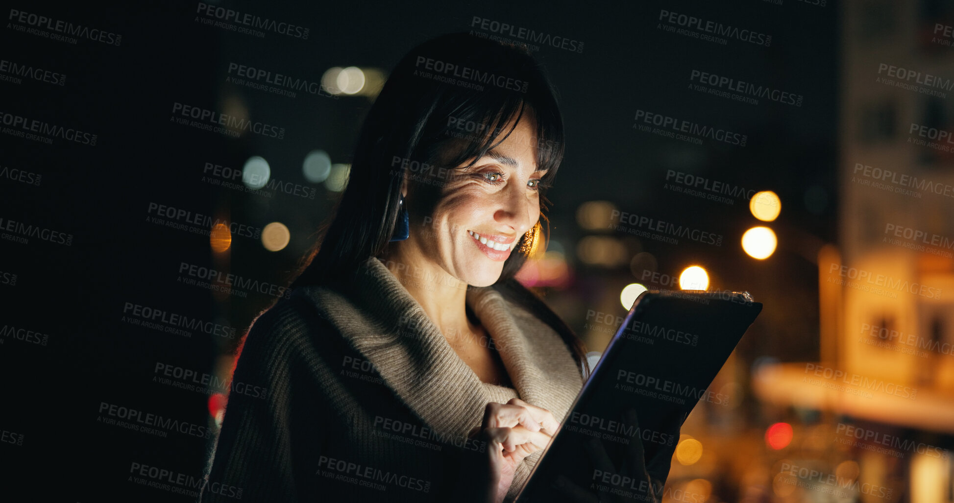 Buy stock photo Happy, businesswoman and tablet in city at night for portfolio review, market research and bokeh. Financial advisor, mature person and smile with digital tech to monitor investment for global client