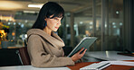 Tablet, night and business woman in office, reading report or fact check for article. Company, journalist and mature editor with technology for news story, research or schedule with bokeh on overtime