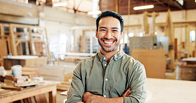 Buy stock photo Man, carpenter and arms crossed in portrait at workshop with pride, smile and furniture manufacturing. Person, small business owner and happy with woodwork, craft or excited at factory in Indonesia