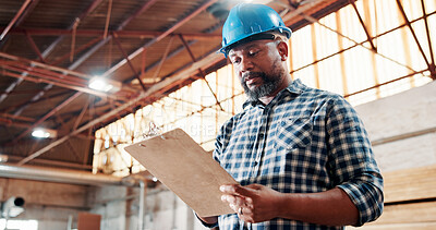 Buy stock photo Black man, carpenter and clipboard with checklist for woodwork, project or inventory in warehouse. Male person, carpentry or list in furniture business for wood construction or stock check in depot