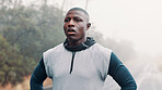Tired, outdoor and black man with exercise, training and breathing with wellness, rest or morning. African person, runner or healthy athlete with fitness, exhausted or hobby with fatigue or challenge