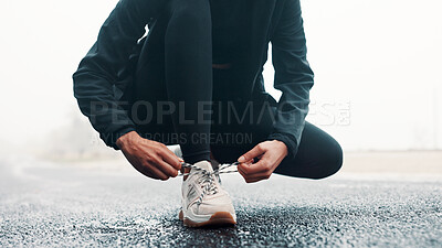 Buy stock photo Hands, person and tie laces for fitness routine, endurance training and running preparation. Athlete, runner and tying shoes for exercise safety, getting ready and sports workout for wellness outdoor
