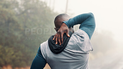 Buy stock photo Back, fitness and stretching with man on mountain trail for start of cardio or training routine. Exercise, warm up and workout with athlete person outdoor in overcast forest for health or wellness