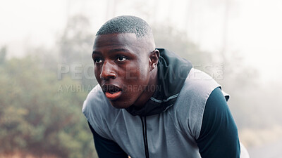 Buy stock photo Tired, outdoor and black man with fitness, breathing or challenge with wellness, rest or break. African person, runner or healthy athlete with exercise, exhausted or training with fatigue or sweating