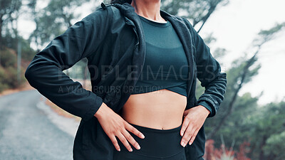 Buy stock photo Woman, hands and fitness with stomach in nature mist for winter challenge, workout or outdoor exercise. Active, female person or runner with slim belly or fog on road for training, health or wellness