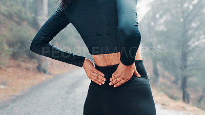 Buy stock photo Outdoor, back pain and woman with fitness, tension and accident with burnout or training. Female person, nature and runner with exercise, joint injury or frustrated athlete with muscle strain