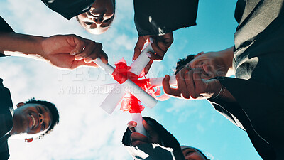 Buy stock photo Happy people, hands and graduation with certificate below for qualification, education or university. Low angle, students or group of friends with diploma or degree for academic milestone together