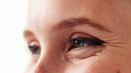 Woman, closeup and vision with eyes in studio for eyesight, visual perspective and insight. Female person, retinal focus and lens coordination for perception, clear sight and peripheral awareness
