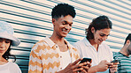 Phone, smile and text message with friends outdoor together for connection or social media browsing. App, contact and typing with group of happy people in line for chatting online or communication