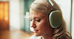 Headphones, home or woman listen to podcast for positivity, reflection or self growth in audio storytelling. Wellness radio, encouragement or person hearing with tech, inspiration or optimism sound 