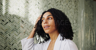 Buy stock photo Beauty, hair care and woman in bathroom in home for morning routine with grooming for health. Wellness, cosmetic treatment and female person with curly texture for hairstyle with growth in apartment.