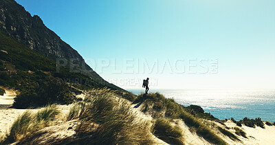 Buy stock photo Hiking, nature and man by ocean for view, travel or vacation by mountain. Trekking, backpacking and person outdoor by sea for sightseeing on holiday, adventure and exploration with mockup space