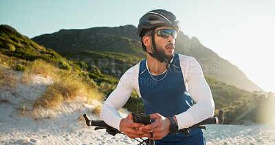 Buy stock photo Fitness, cyclist and man with cellphone in nature for networking, chatting or connectivity with training. Sports, cycling and athlete with phone for texting, communication or contact on mobile app.