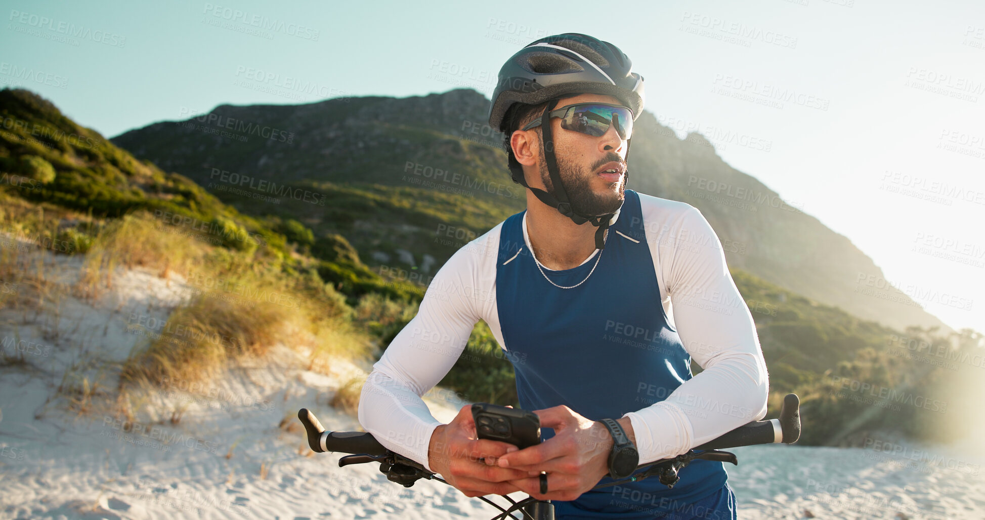 Buy stock photo Fitness, cyclist and man with cellphone in nature for networking, chatting or connectivity with training. Sports, cycling and athlete with phone for texting, communication or contact on mobile app.