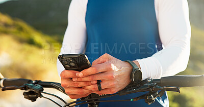 Buy stock photo Hands, cyclist and man with phone in nature for networking, chatting or connectivity with training. Fitness, cycling and athlete with cellphone for texting, communication or contact on mobile app.