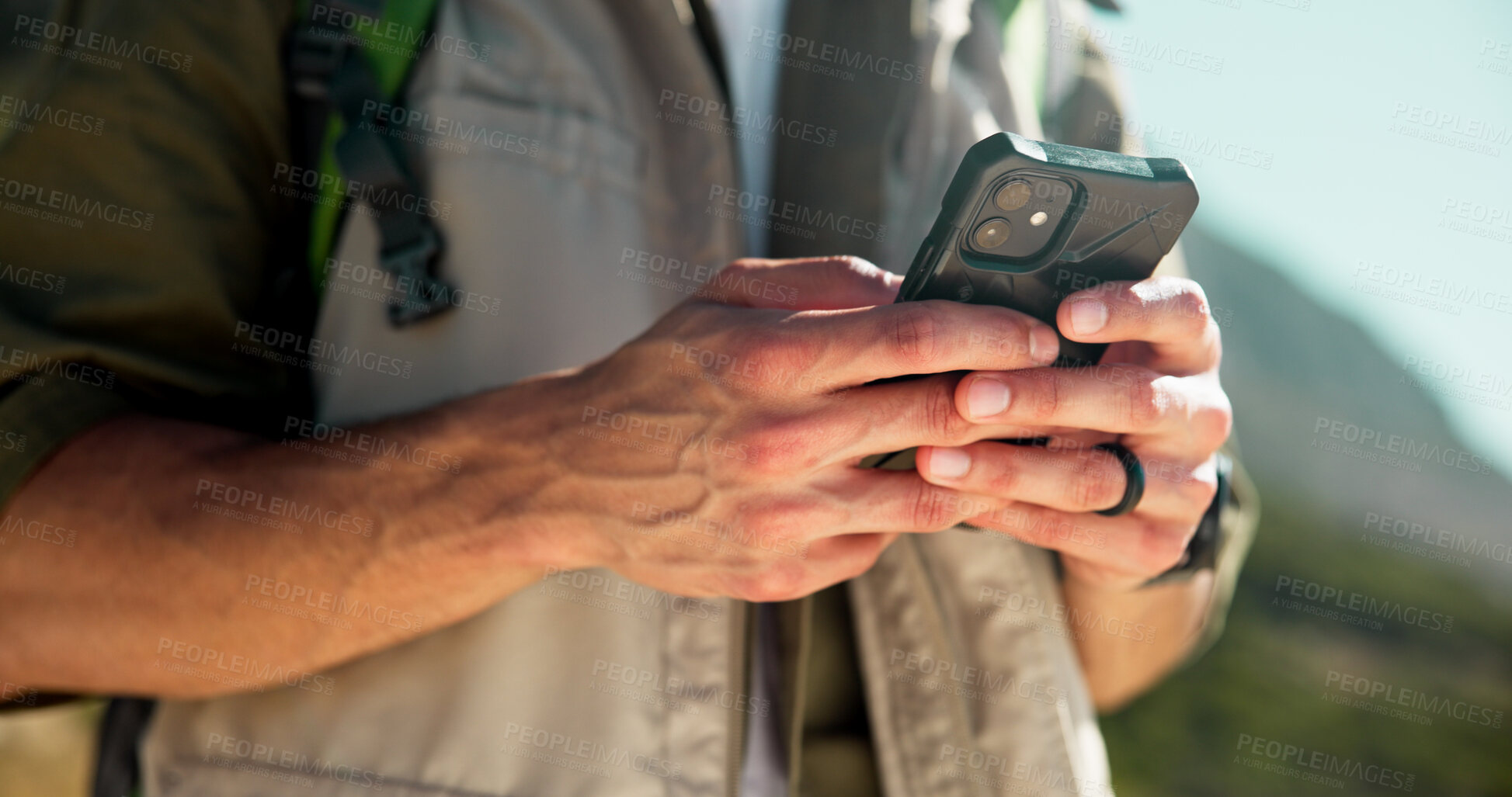 Buy stock photo Outdoor, hiking and man with cellphone, hands and online chatting with app for direction. Healthy person, traveller and smartphone with social media and track progress with internet and connection