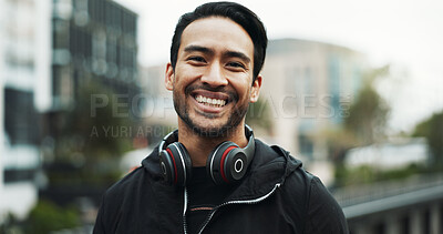 Buy stock photo Fitness portrait, man and happy in city for exercise break, wellness progress and cardio training. Headphones, athlete and smile in urban town for workout rest, running practice and pace improvement