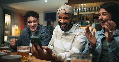 Buy stock photo Winning, friends and celebration with phone in pub for streaming match, sports goal and team support. Football fans, people and smartphone with success in bar for game score, live broadcast or event