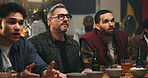 Anxiety, watching tv and men in pub for sports game with championship for entertainment together. Stress, live streaming and group of male friends with football match in bar for online tournament.