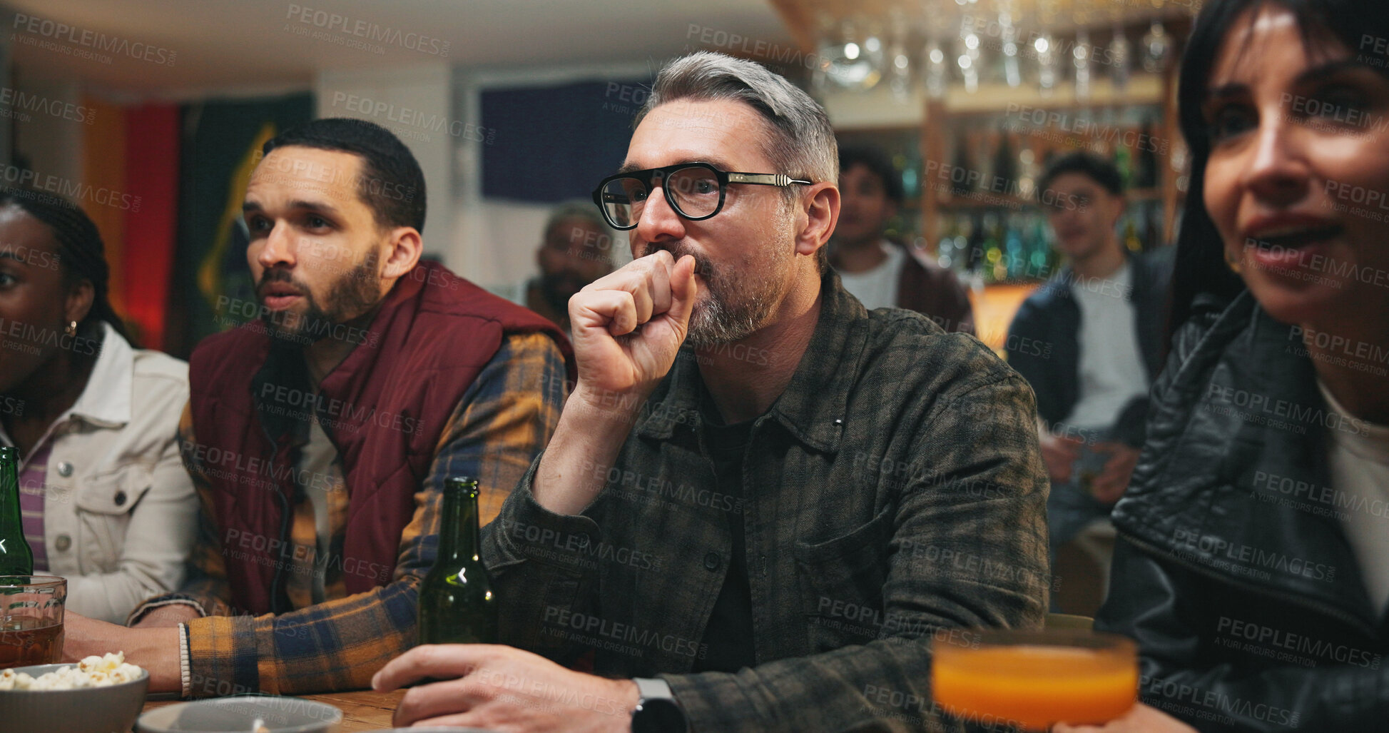 Buy stock photo Stress, watching tv and friends in pub for sports game with championship for entertainment together. Anxiety, live streaming and group of male fans with football match in bar for online tournament.