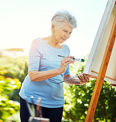Buy stock photo Senior woman, brush and painting outdoor on canvas, nature inspiration and creative art. Elderly person, park and drawing sketch on easel for artwork, craft technique and diy creation for retirement