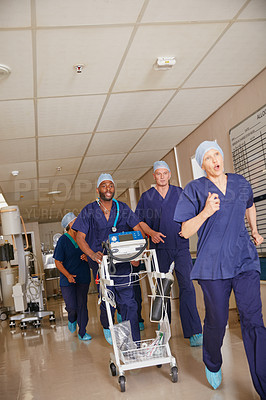 Buy stock photo Medical team, emergency and running with equipment in hospital for healthcare, nurses or save life. Surgeon group, tools and people rush with urgency, help and vital signs monitor in clinic hallway
