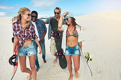 Buy stock photo Sand boarding, travel and fitness with friends in desert for adventure, hobby and happy. Dune surfing, extreme sports and summer vacation with people outdoor for action, tourism and balance together