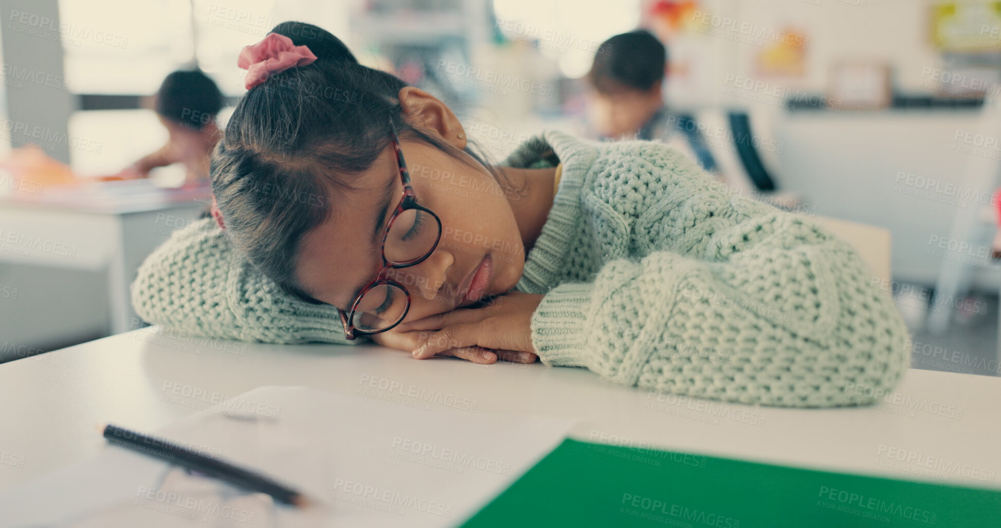 Buy stock photo Girl, child and fatigue with sleeping in classroom with drawing, color or art with burnout at academy. Kid, lazy and rest with  sketch, bear and tired for education, development or creative at school