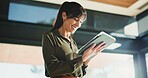 Woman, realtor and smile with tablet, property management or service review in office. Low angle, estate agent and digital tech in agency for commission update, app scroll or thinking for research