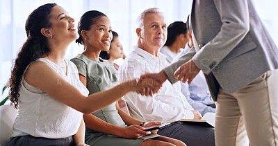 Buy stock photo Business woman, smile and handshake at seminar for greeting, meeting or thank you for introduction. Team, people and shaking hands at conference for hello, networking and welcome to office workshop