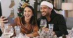 Christmas, selfie or happy couple with wine in house, social media post or profile picture update. Festive holiday, celebration or people with photography at dinner table for memory, smile or alcohol