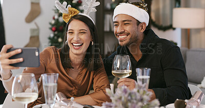 Buy stock photo Christmas, selfie or happy couple with wine in house, social media post or profile picture update. Festive holiday, celebration or people with photography at dinner table for memory, smile or alcohol