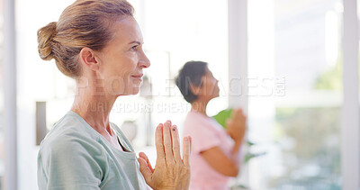 Buy stock photo Yoga class, mature woman and prayer hands for fitness, mindfulness or meditation for peace. Yogi, namaste and person with friends in studio, zen or smile with holistic exercise for spiritual wellness