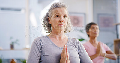 Buy stock photo Elderly woman, prayer hands and stretching with yoga class for spiritual wellness or balance together. Senior people, yogi and personal trainer in pose for warm up, mindfulness or retirement exercise