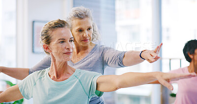 Buy stock photo Mature people, fitness and stretching with yoga class for spiritual wellness or balance together. Senior women, yogi and coaching in warriors pose for warm up, mindfulness or retirement exercise
