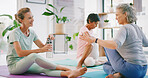 Break, woman and talking with water in yoga class for exercise pause, fitness discussion or support. Wellness club, mature people and relax with liquid on mat for practice rest, conversation or happy