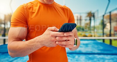 Buy stock photo Fitness, texting and hands on tennis court with phone, match schedule and social media update on rest. Sport, man and athlete outdoor with tech, wellness chat and virtual tutorial on training break.